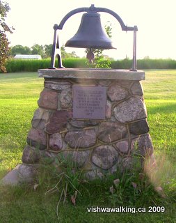 Hoards Station,locally-made bell displayed on the lawn at Hoards United Church