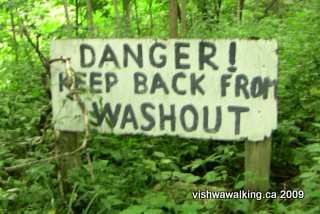 Ganaraska trail, north of Hope township's 5th line, warning sign re a washout.
