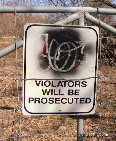 lower trent trail, sign, warning people off the railroad track. west of 1st Trent-Severn lock.