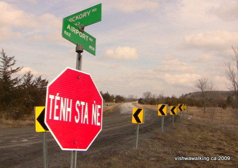 sign at airport and hickory roads