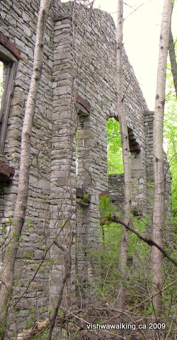 marlbank cement factory, remains of a building's stone wall