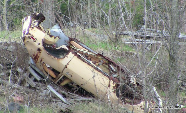transcan, km 68 east of kaladar, wrecked car